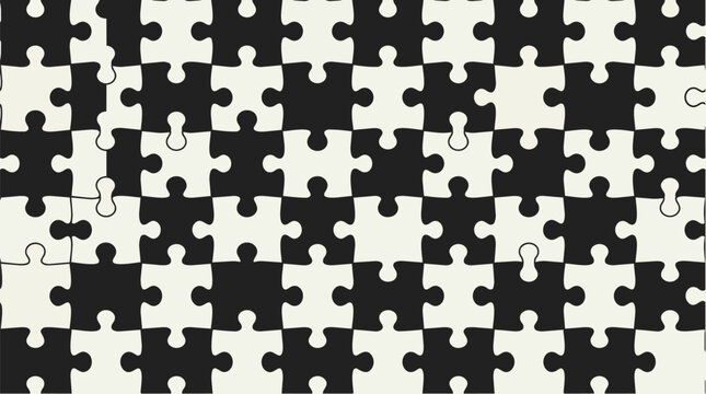 A close-up view of a nearly completed black and white puzzle on a table indoors.