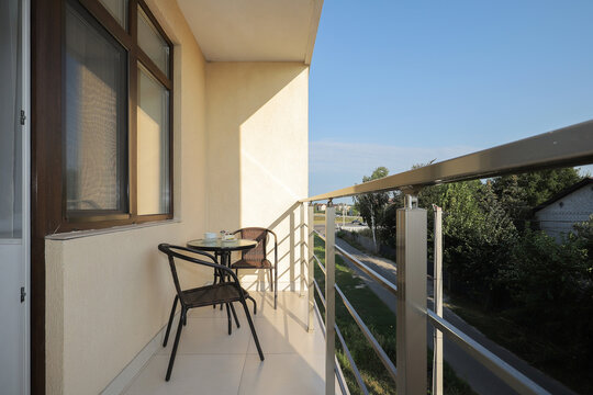Chairs with table in the balcony