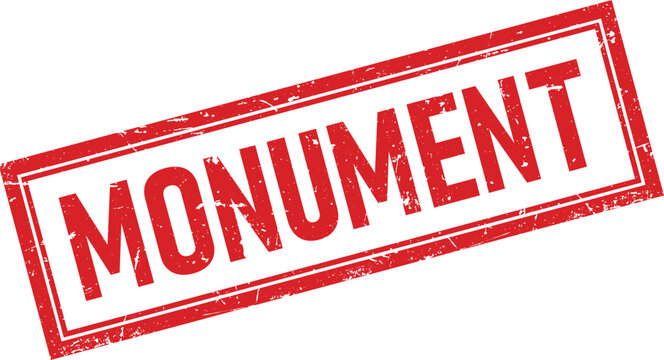 Distressed rectangular red ink rubber stamp containing the word monument in a classic bold typeface