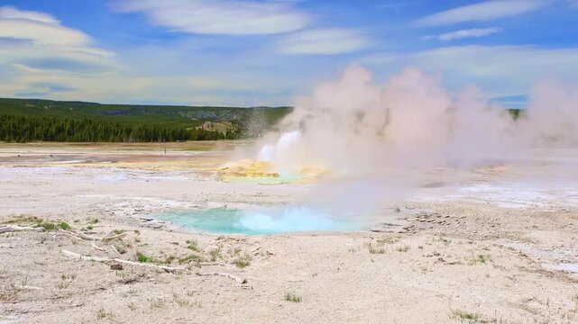 Clepsydra and Spasm geysers erupt simultaneously along Fountain Paint Pot Trail in Yellowstone National Park