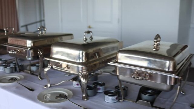 Buffet catering table with chafing dishes