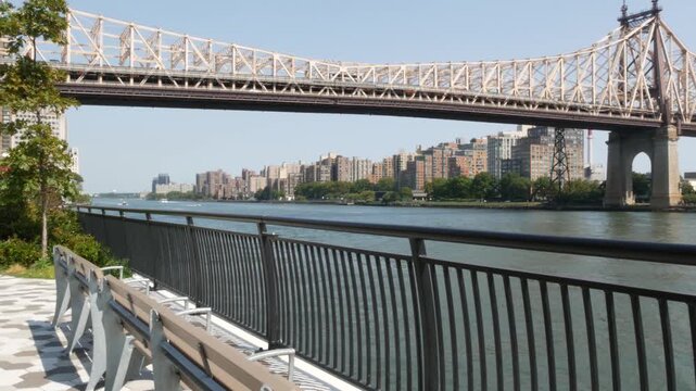 New York City Manhattan Midtown, Queensboro bridge architecture, United States. Urban transport metallic bridge to Queens and Roosevelt island, East River. Esplanade in East Side. Urban promenade park