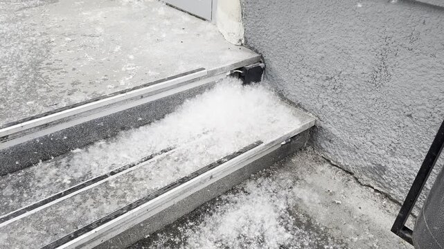 Accumulation of poplar fluff on outdoor steps, illustrating the gradual buildup across three frames. The steps are bordered by a gray wall and show a textured surface with visible debris