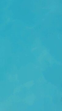 Tranquil turquoise water surface creating a mesmerizing abstract background, perfect for calm and relaxing concepts related to wellness, travel, and environmental themes