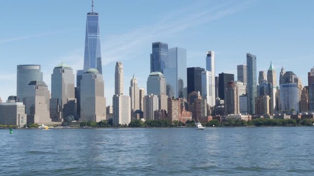 New York City Manhattan Downtown Financial District skyline, World Trade Center tower from New Jersey Liberty state park, United States. Hudson river waterfront urban cityscape, skyscraper buildings.