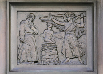 Naklejka premium Sacrifice of Isaac, Close-up of a biblical relief on the Lion Gate of the Cathedral of Saint James in Sibenik, Croatia