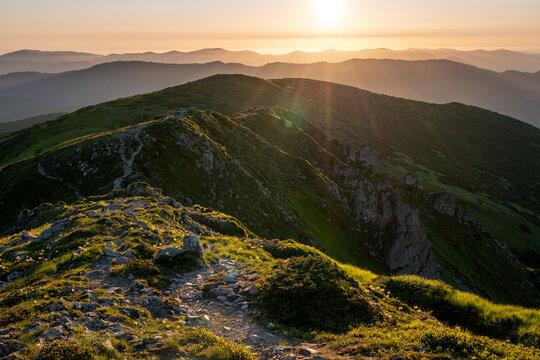 Majestic mountain landscape with rocks and evening sky