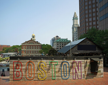 Boston, MA - USA - 08-03-2025: Colorful Boston sign in front of historic Faneuil Hall in the center of old Boston