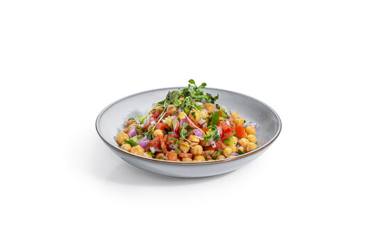 Healthy Mediterranean Chickpea Salad with Fresh Vegetables and Microgreens