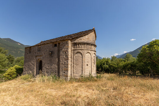 Biescas, Spain. San Juan de Busa Hermitage, built 1060-1070 by Ramon Guillen, Mozarabic and Lombard Romanesque style, with unfinished semicircular apse and distinctive keel-shaped roof. Serrablo