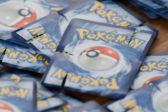 pile of worn and torn pokemon cards, english tcg version