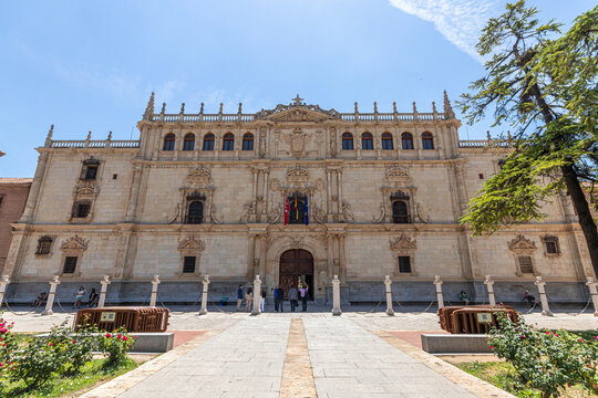 Alcala de Henares, Spain. Facade of the Colegio Mayor de San Ildefonso, built 1537-1553 by architect Rodrigo Gil de Hontanon, masterpiece of the Spanish Plateresque style, UNESCO World Heritage Site