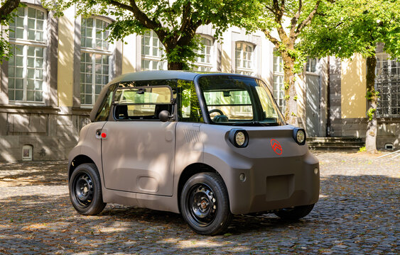 New 2026 Citroen Ami electric microcar parked in a small french town