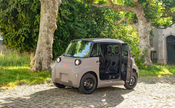 New 2026 Citroen Ami electric microcar parked in a small french town