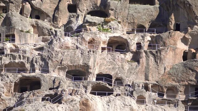 Vardzia cave monastery carved into Erusheti Mountain cliffs in Georgia, a historical 12th-century medieval landmark of Europe