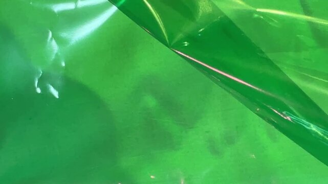 Iridescent green plastic texture