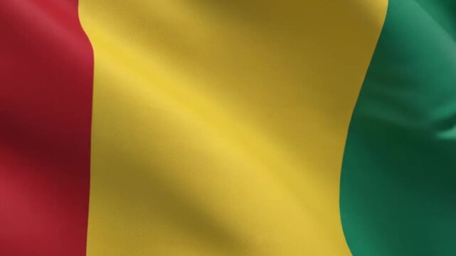 Waving flag of guinea, a country in west africa, featuring vertical stripes of red, yellow, and green