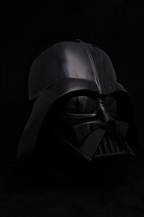 Obraz premium Professional photograph of a Darth Vader helmet on dark velvet, captured in El Salvador, Cinemark on June 26, 2026.