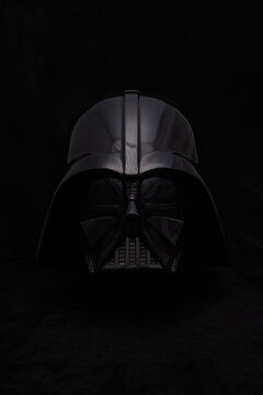 Professional photograph of a Darth Vader helmet on dark velvet, captured in El Salvador, Cinemark on June 26, 2026.