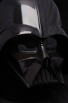 Professional photograph of a Darth Vader helmet on dark velvet, captured in El Salvador, Cinemark on June 26, 2026.