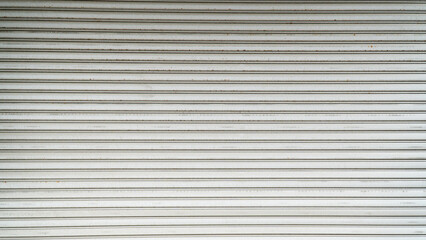 Fototapeta premium White Corrugated Metal Shutter Door with Horizontal Ribs Texture