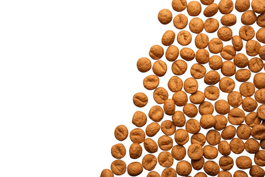 Traditional dutch kruidnoten cookies or spice nuts snack on transparent background for sinterklaas holiday