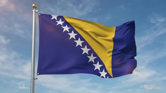 Waving flag of bosnia and herzegovina against a blue sky