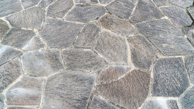Irregular Gray Flagstone Paving with a Crazy Paving Pattern Texture