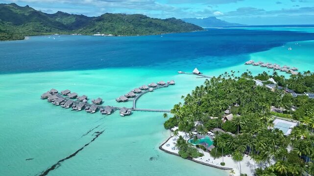 Idyllic tropical resort with overwater bungalows