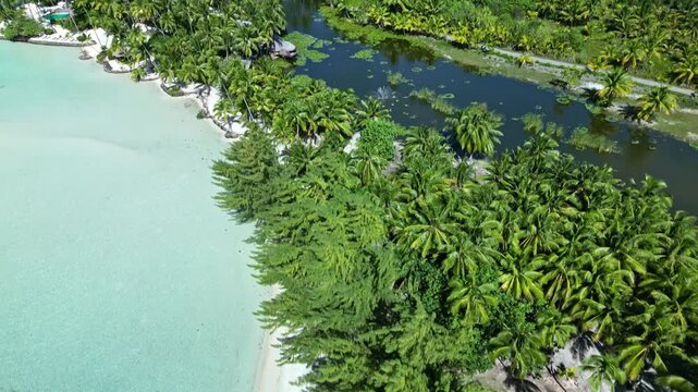 Aerial view of bora bora overwater bungalows and turquoise lagoon