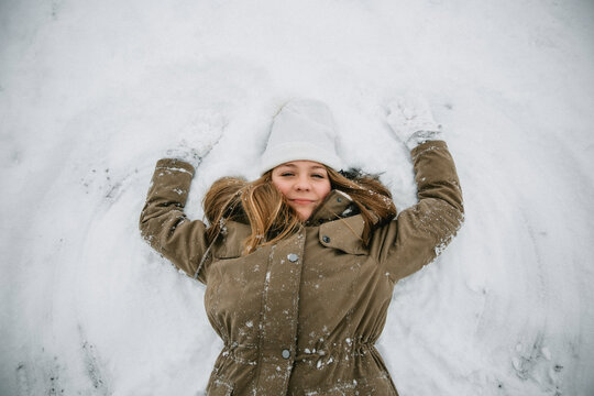 Girl Making a Snow Angel