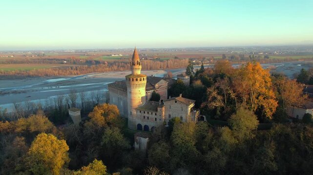 Drone view footage of the historic Castello di Rivalta in Piacenza, Emilia-Romagna, captured with its medieval towers, stone walls, and village setting&mdash;ideal for travel, heritage