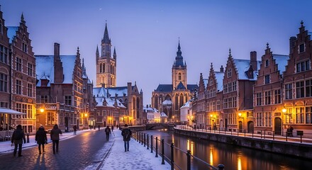 Fototapeta premium Historic European city skyline at twilight with illuminated cathedral.