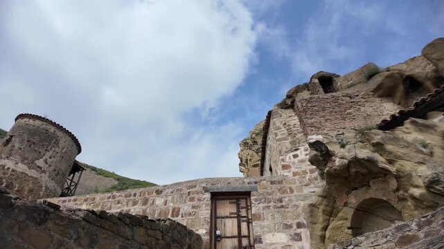 David Gareji. A historic rock-hewn monastery complex in Georgia. Featuring ancient stone structures. Cave dwellings. And monastic cells carved into the cliffs in Georgia, Europe