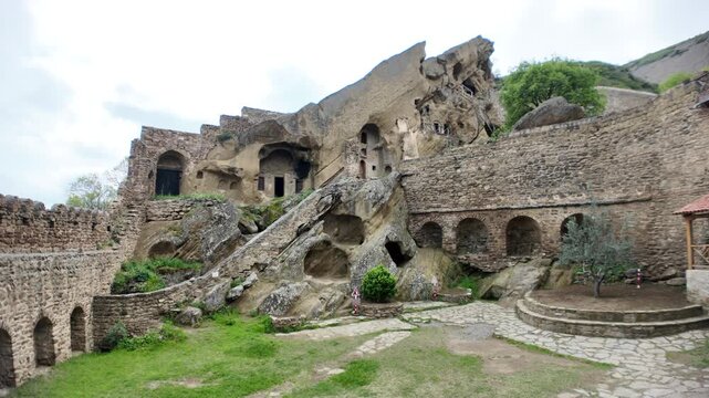 David Gareji. A historic rock-hewn monastery complex in Georgia. Featuring ancient stone structures. Cave dwellings. And monastic cells carved into the cliffs in Georgia, Europe