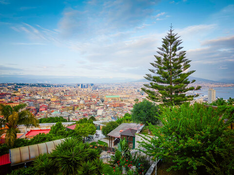 Aerial drone view of Naples old town panorama, scenic cityscape of historic center and iconic volcano view in Italy