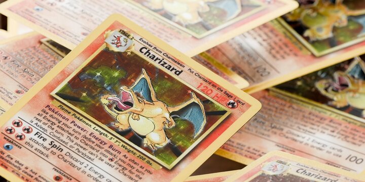 pile of ultra rare charizard base set pokemon cards, english tcg version
