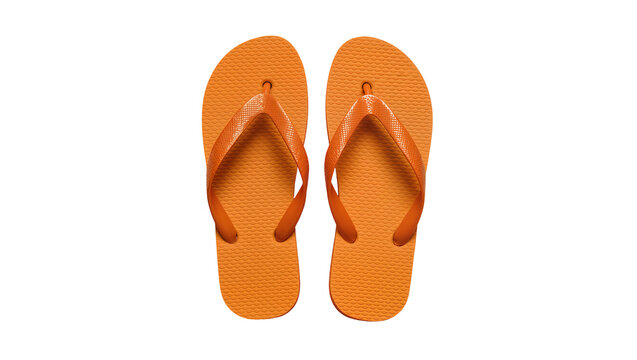 Isolated pair of vibrant orange summer flip-flops, essential for beach trips and casual outings