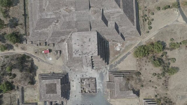 Stunning aerial top down view of the ancient pyramid of the moon in teotihuacan, mexico, with tourists exploring the vast archaeological site and its impressive historical monuments