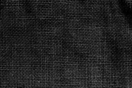 Black sackcloth fabric texture or background with gradients shadow horizontal shape, copy space (High resolution) , real photo