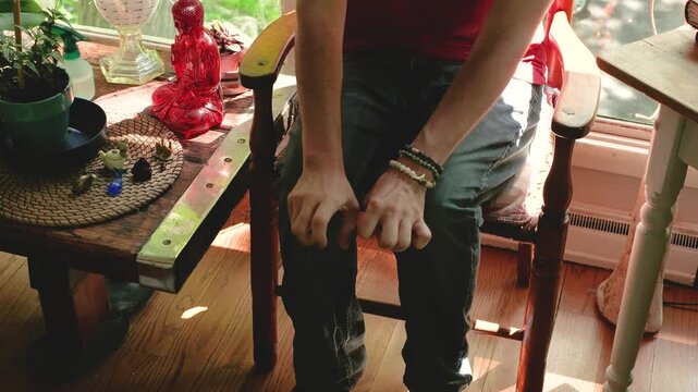 Neurodivergent man performing hand stimming movements
