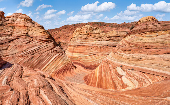 Amazing rock formations of The Wave - Coyote Buttes North area of the Paria Canyon - Vermilion Cliffs Wilderness on the Arizona and Utah border
