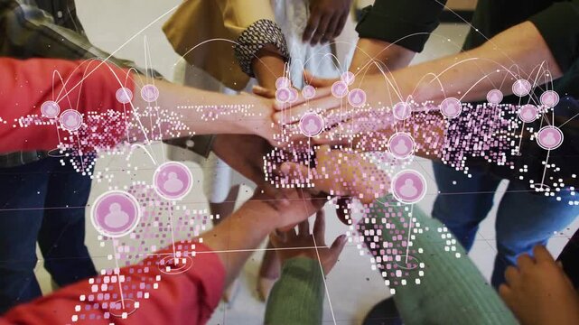 Business team reaching and stacking hands for unity, with pink network overlay growing across stack