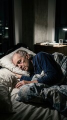 Fototapeta premium Senior Man Sleeping Restfully In Bed At Nighttime With City Lights