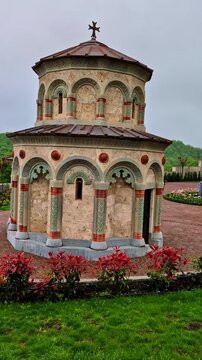 Ornate stone chapel with arched details at the Monastery of St. Nino at Bodbe, Georgia