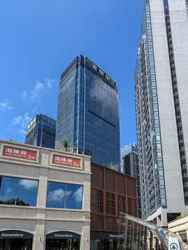 Modern skyscrapers rising above traditional architecture in china