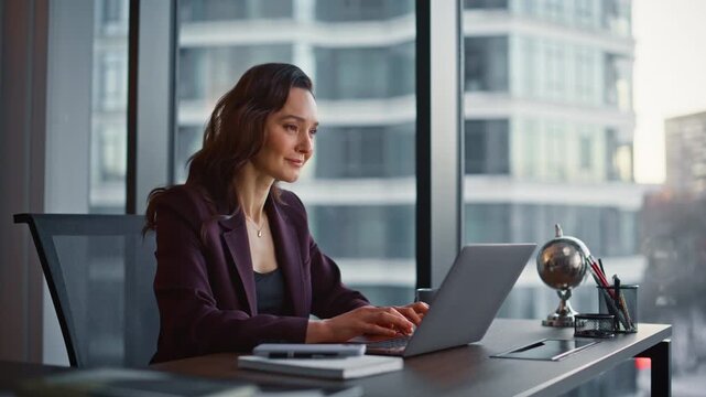 Woman manager corresponding client using laptop sitting luxury office closeup