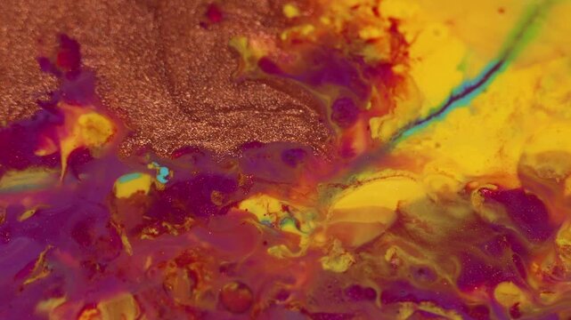 Liquid paint footage. Abstract Cinematic Motion Macro Acrylic Footage Background in Red Gold Magenta Pink Yellow
