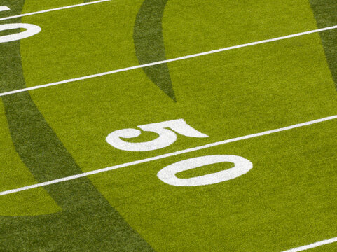 Close-up of green football field grass