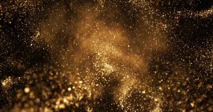 Golden light particles exploding and expanding in a dark background